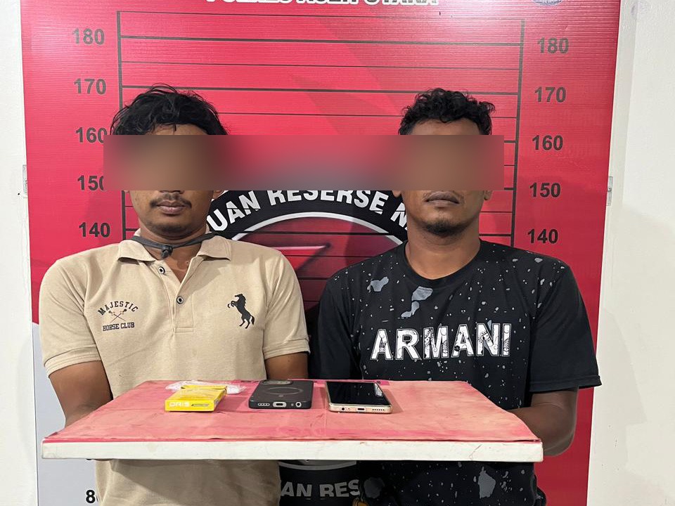 Foto: Kedua tersangka berinisial AS (25), warga Ujong Pacu, Kecamatan Muara Satu, serta AM (31), warga Gampong Blang Bidok, Kecamatan Tanah Luas, Dok. Humas Polres Aceh Utara